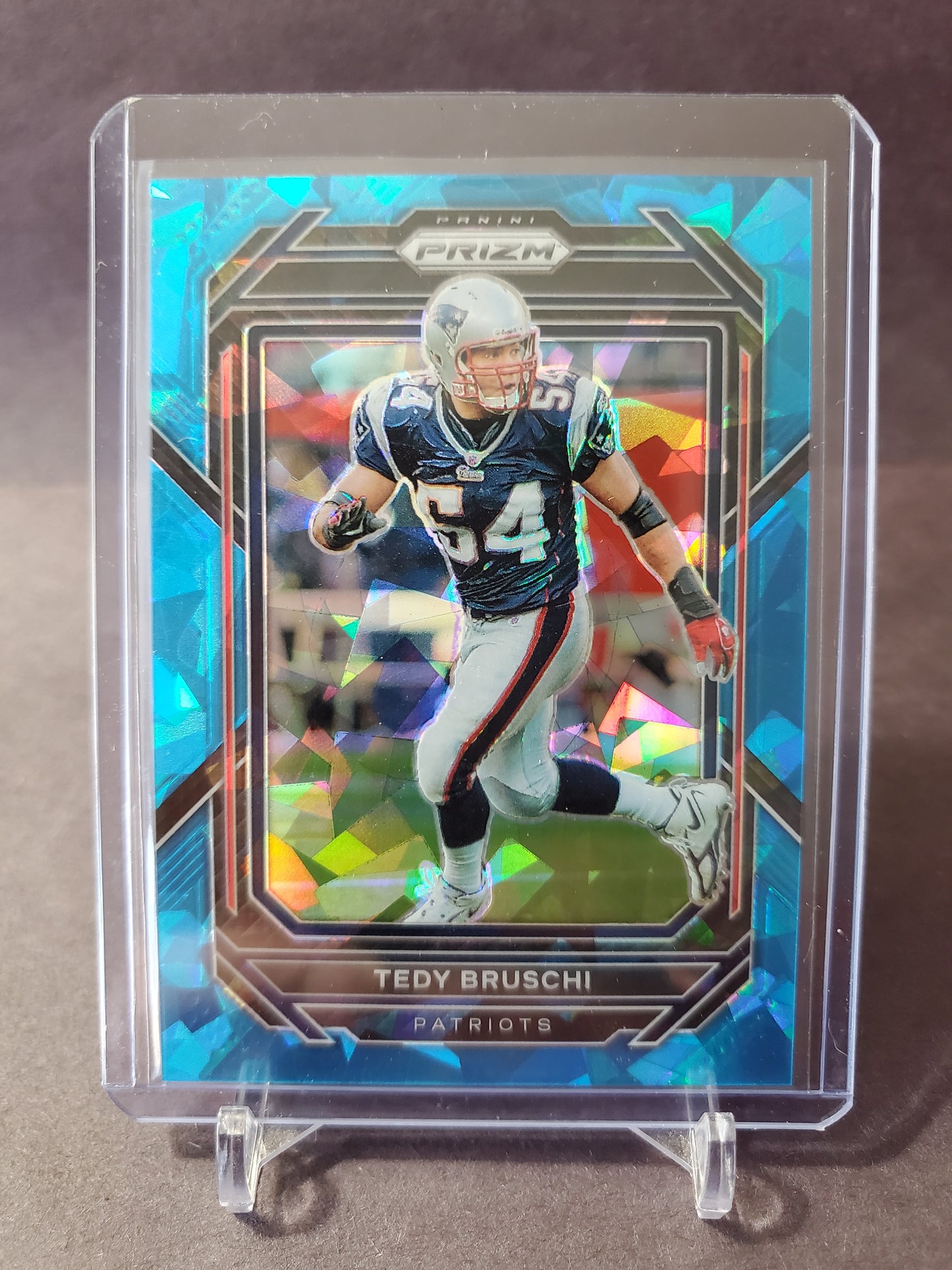 2022 Panini Prizm Football Tedy Bruschi #206 Blue Cracked Ice Parallel /99 Refractor