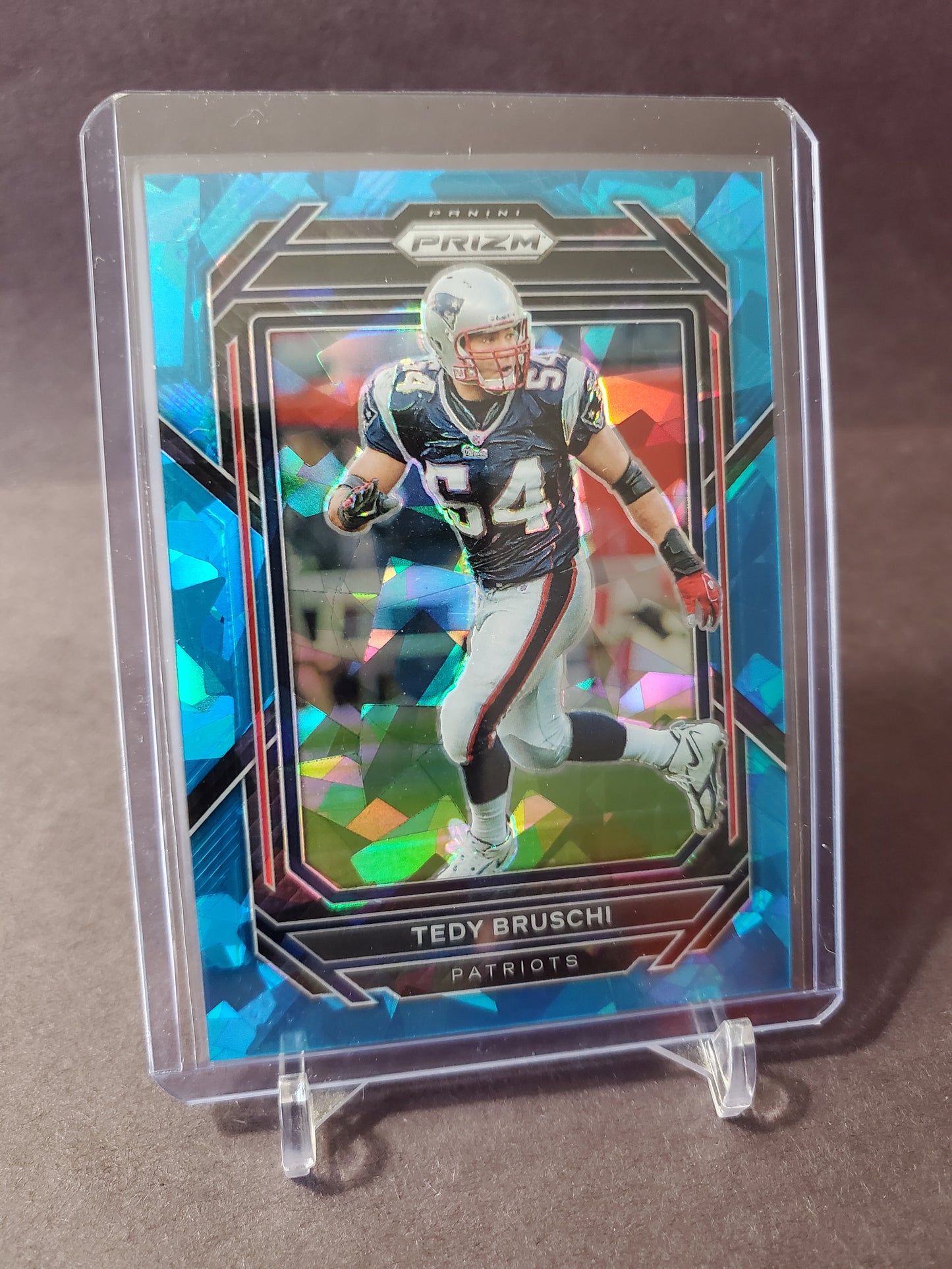 2022 Panini Prizm Football Tedy Bruschi #206 Blue Cracked Ice Parallel /99 Refractor